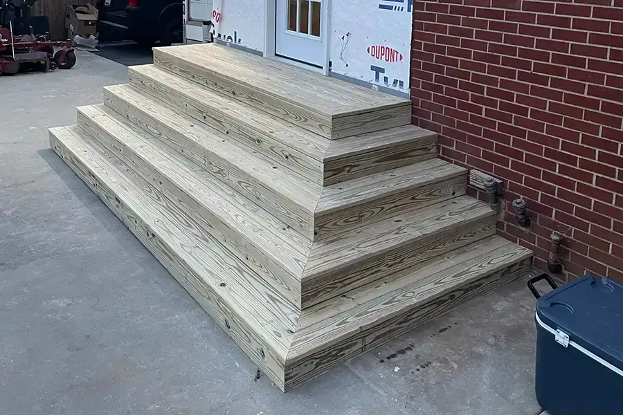 wood deck steps on exterior of building